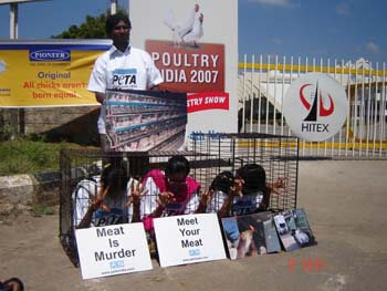PETA Activists caged to protest Poultry India 2007 in Hyderabad