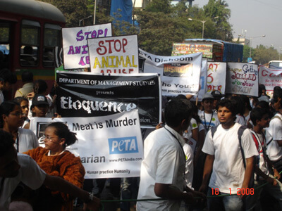 SIES College students & PETA join hands to march against Animal abuse .