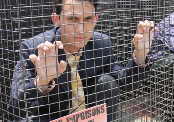 PETA Members Caged to Protest AIIMS Cruelty