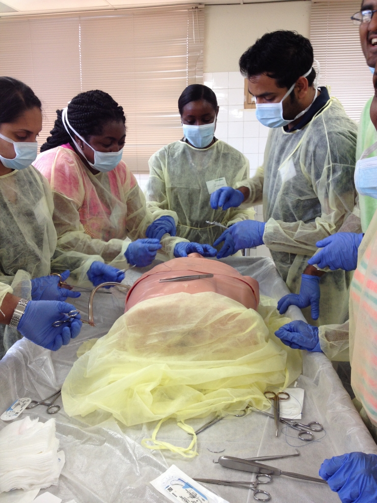 Participants using TraumaMan models, which PETA donated to replace animal use, in an Advanced Trauma Life Support (ATLS) program in Trinidad and Tobago.