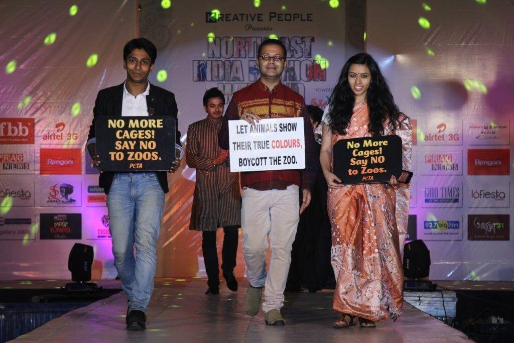 Along with the designer, PETA representatives Sachin Bangera and Shambhavi Tiwari walk the runway for animals. 