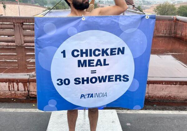 Man Took Public Shower to Show Meat’s Devastating Role in Drought