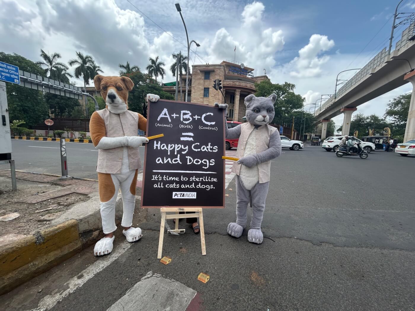 Giant ‘Cat’ and ‘Dog’ Mark Animal Rights Awareness Week with Lesson on ABCs: Animal Birth Control